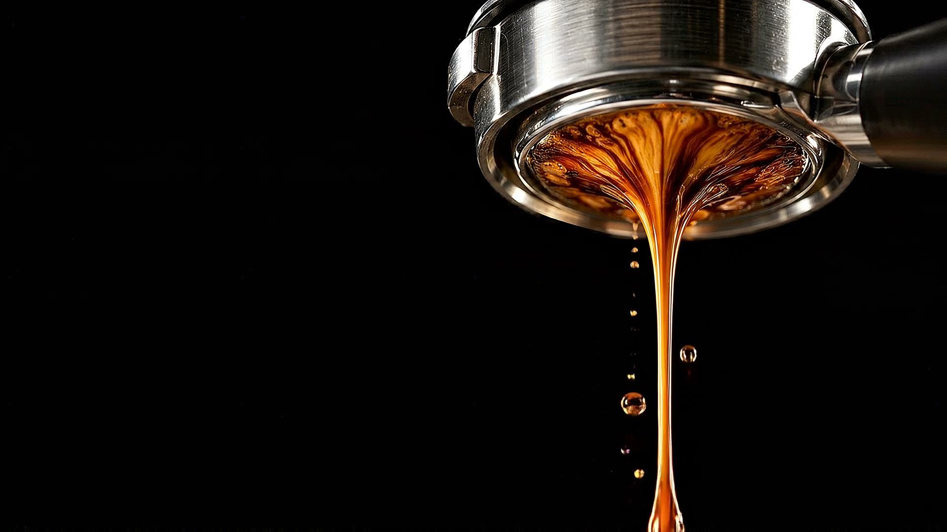 Espresso pouring from a bottomless portafilter, the Kofi Tech hero film